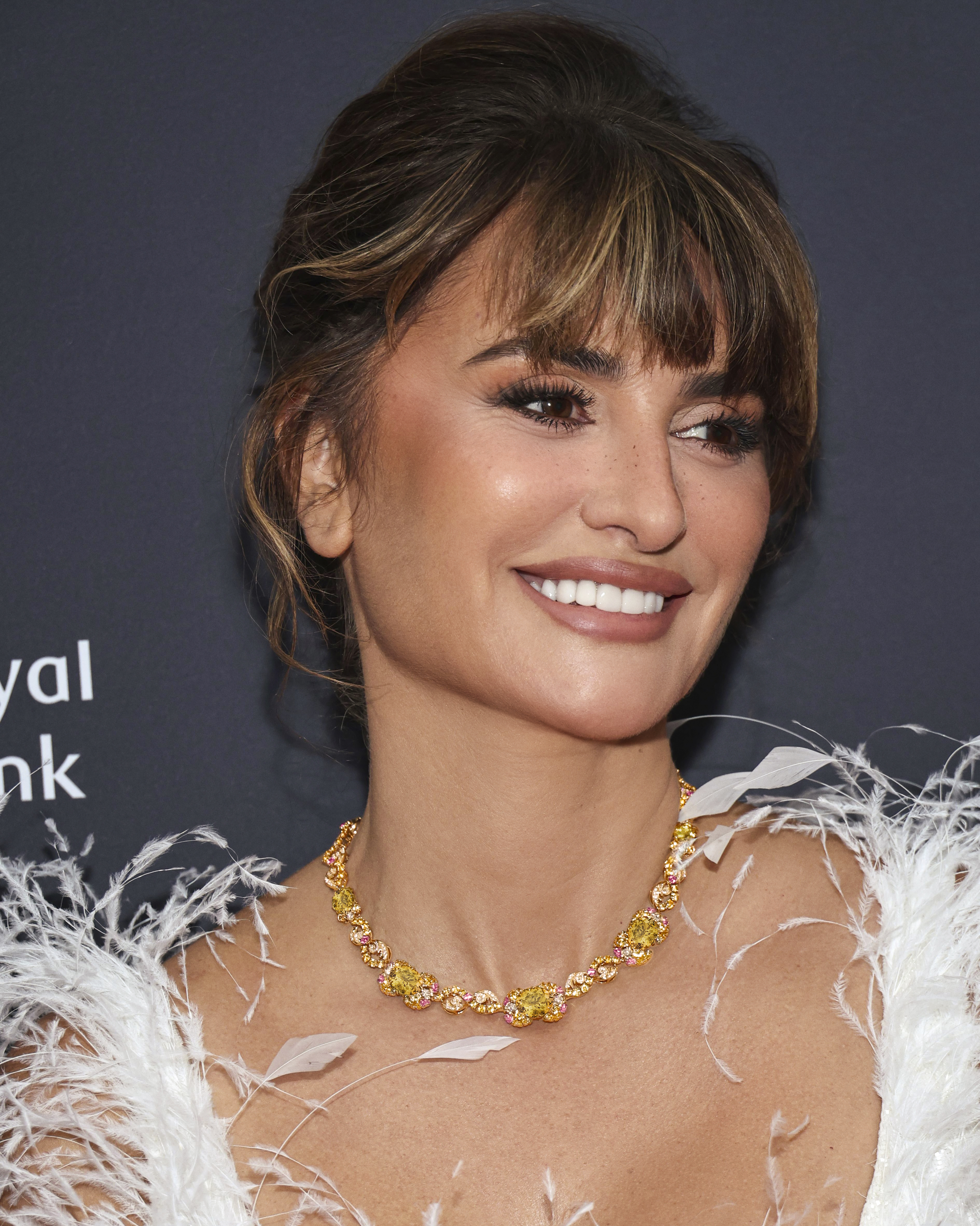 Penélope Cruz wearing ZOYA’s golden heliodor Rekindle Necklace at TIFF
