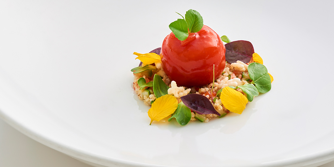 Tomato millet with rice crisp and microgreens at Avartana