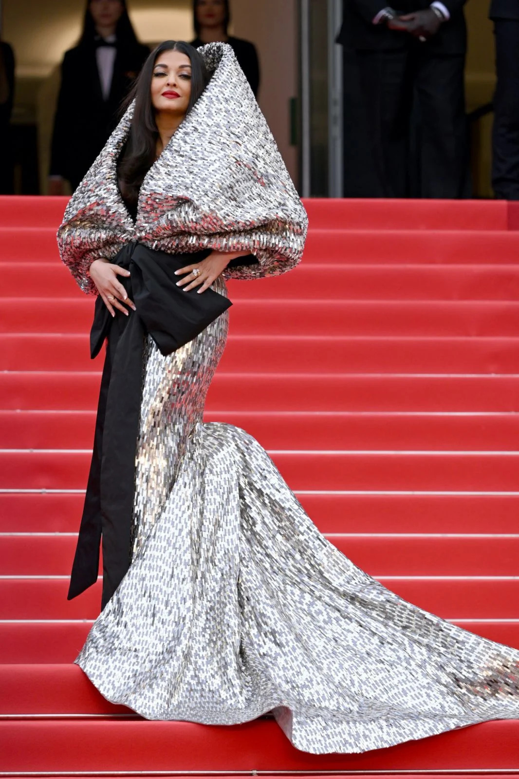 Aishwarya Rai wearing a silver hooded Sophie Couture gown at Cannes in 2023.