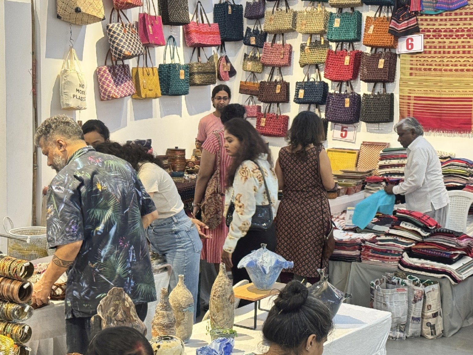Handcrafted bags, textiles and pottery on display
