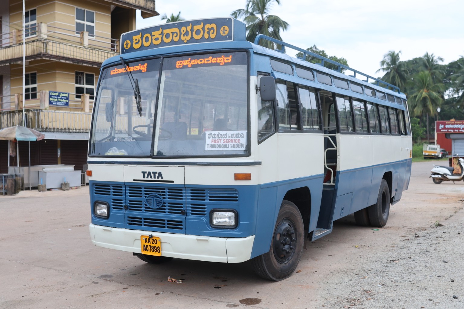 The blue and white private bus featured in Shankarabharana